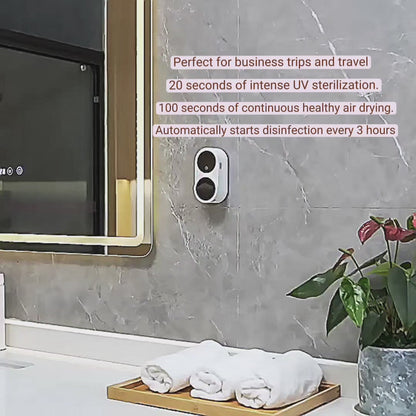Minimalist wall-mounted UV-C toothbrush sanitizer and dryer in a soft matte beige Nordic bathroom.