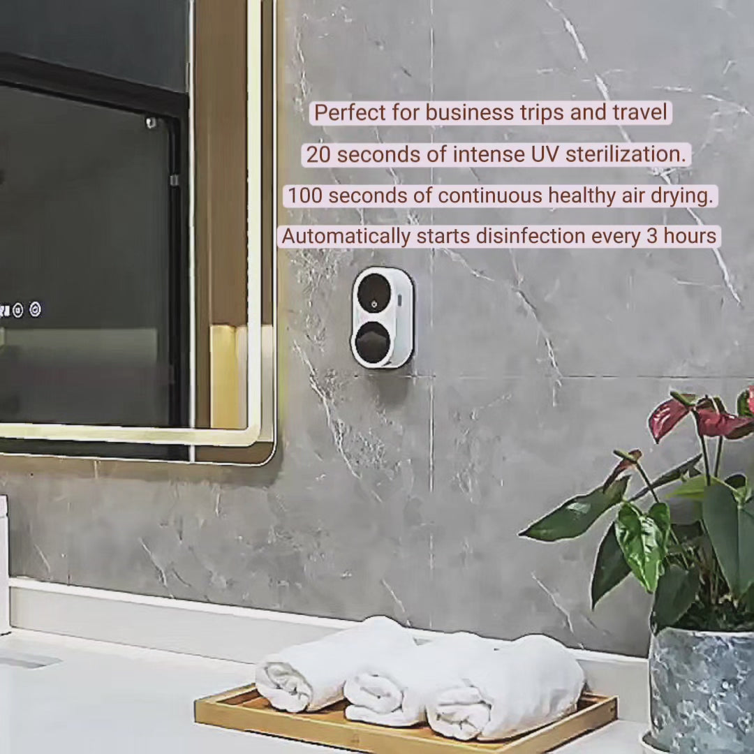Minimalist wall-mounted UV-C toothbrush sanitizer and dryer in a soft matte beige Nordic bathroom.